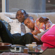 Don Cheadle as Marty Kaan and Donis Leonard, Jr. as Roscoe in House of Lies.